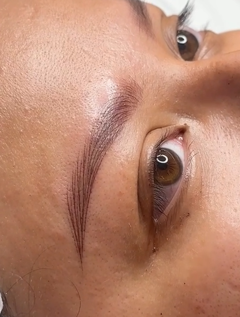 A close up of the eyebrows and eyes of a person